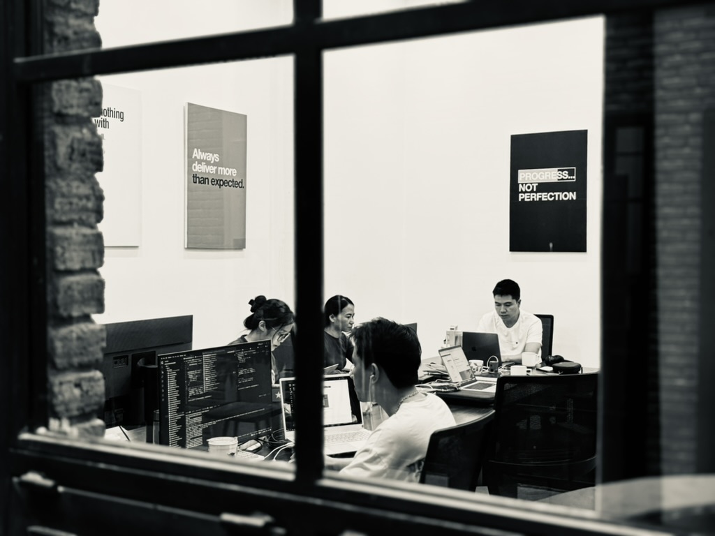 KeystackLabs team working on bespoke website design and AI integration